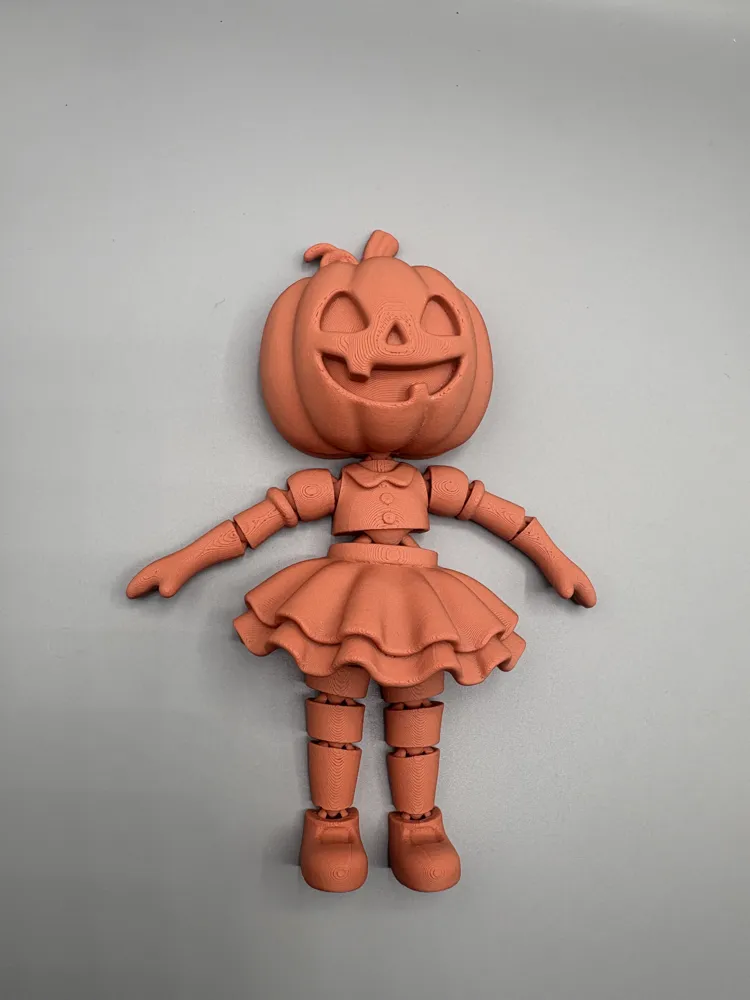 Articulated Halloween Pumpkin Girl Fidget Toy, photo 3 of 4 - Articulated Halloween Pumpkin Girl Fidget Toy Toys & Games