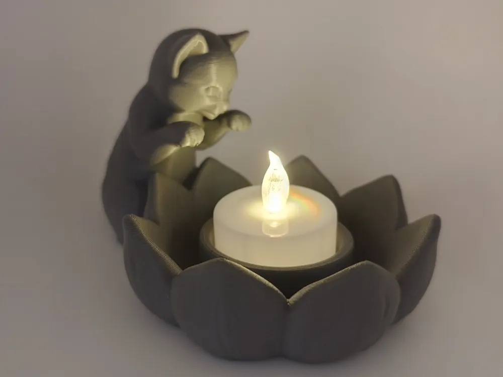 Lotus shaped cat tea light holder