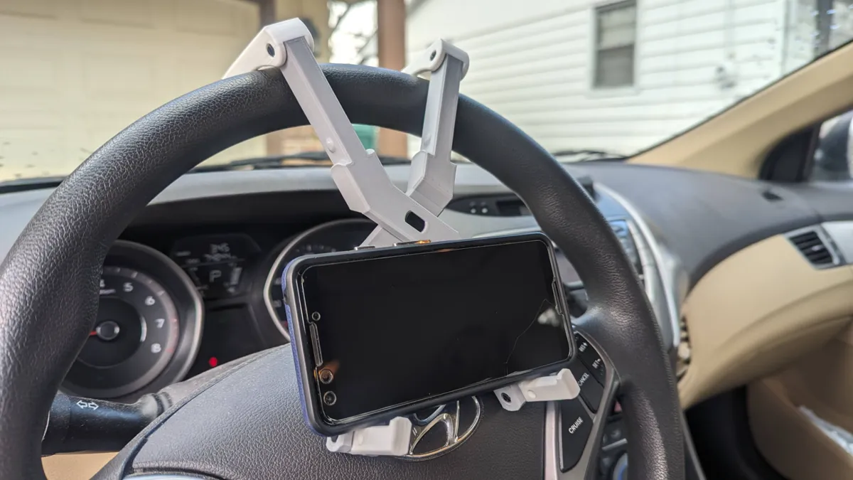Steering Wheel Phone Stand: Park & Watch, photo 2 of 4 - Steering Wheel Phone Stand: Park & Watch Mobile & Device Accessories
