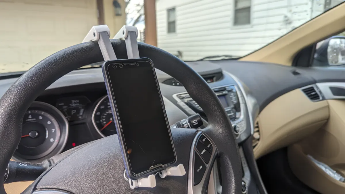 Steering Wheel Phone Stand: Park & Watch, photo 3 of 4 - Steering Wheel Phone Stand: Park & Watch Mobile & Device Accessories