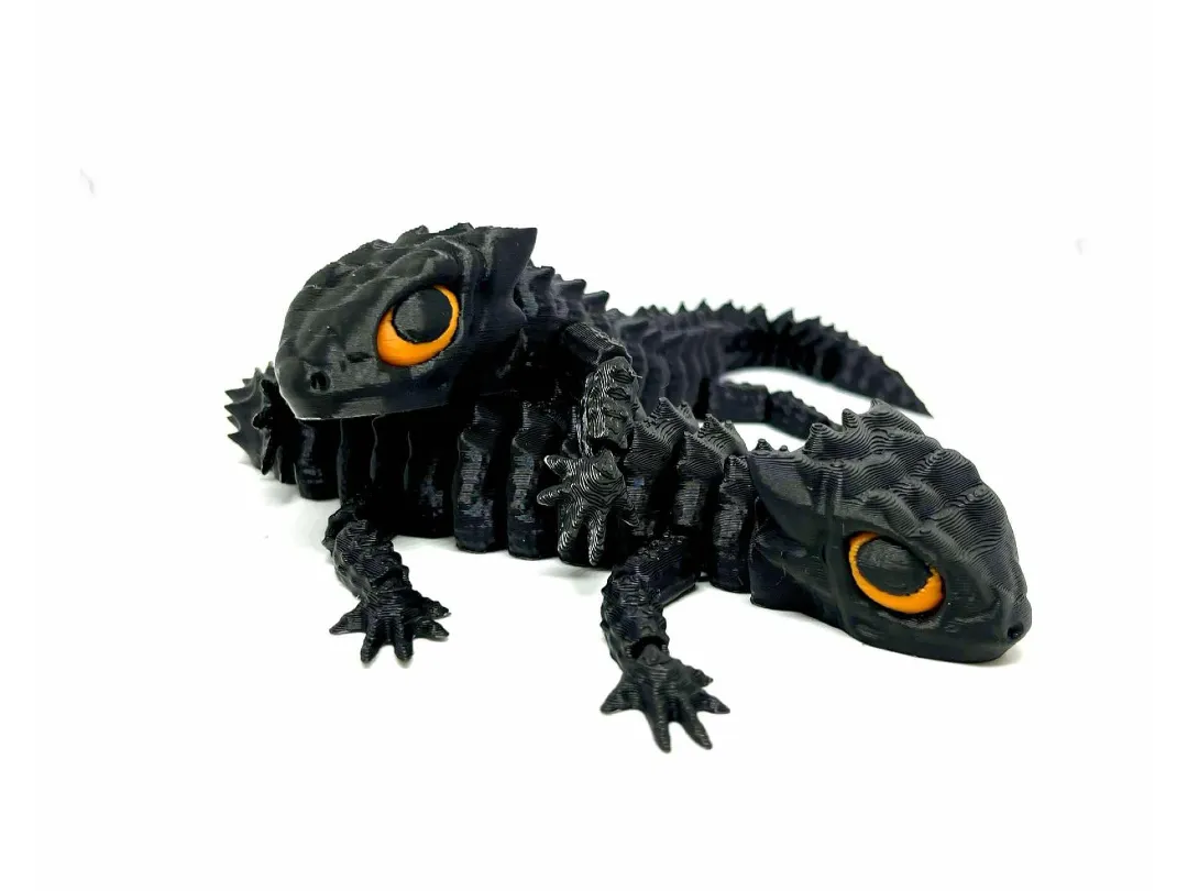 Cute articulated red-eyed crocodile skink!