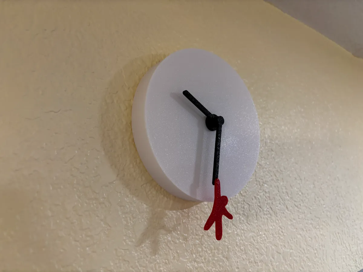 Hanging Man Modern Wall Clock | Minimalist, photo 3 of 4 - Hanging Man Modern Wall Clock | Minimalist Home Decor Items