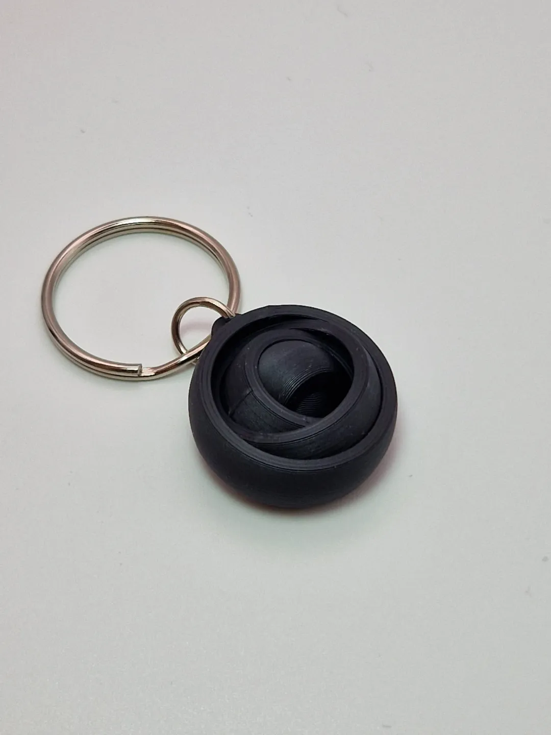 5-Ring Gyro Keychain: The Ultimate Fidget, photo 2 of 2 - 5-Ring Gyro Keychain: The Ultimate Fidget Keychains