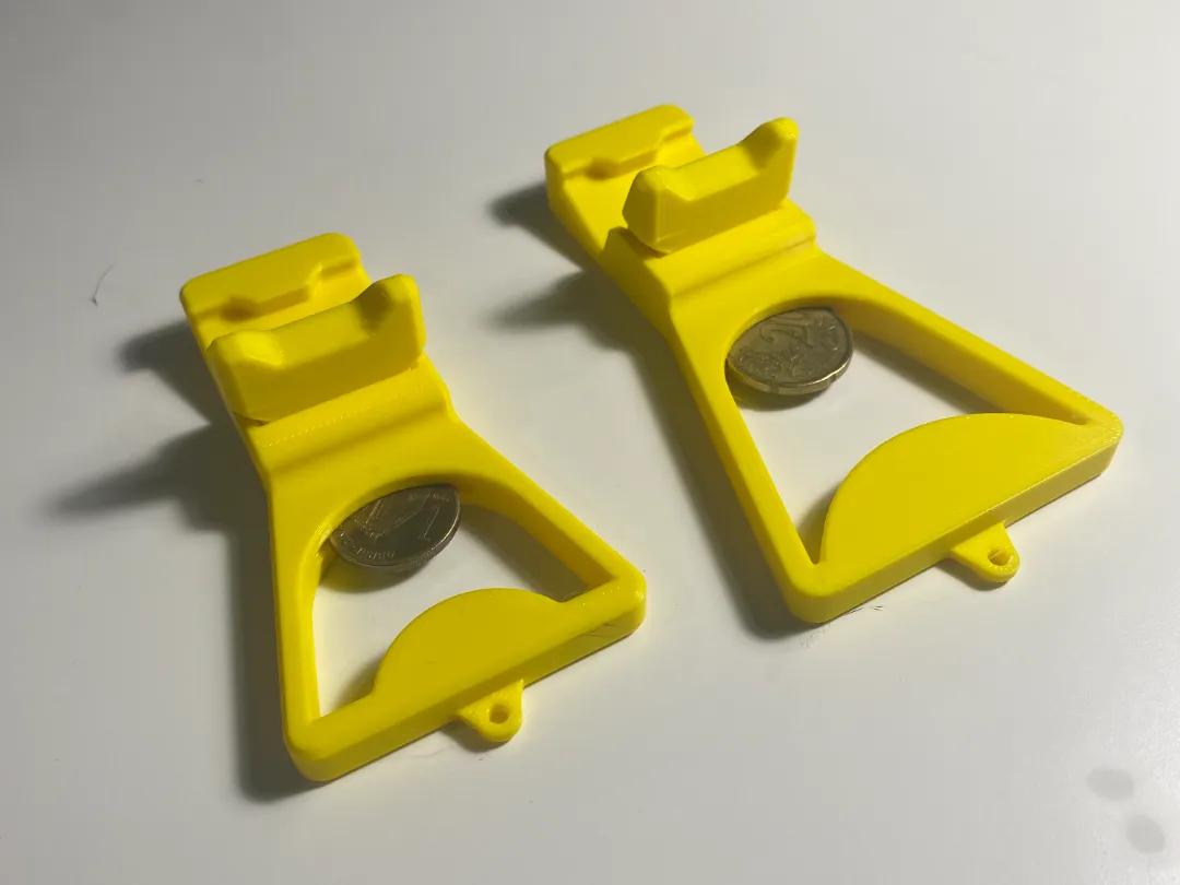 Phone stand and bottle opener with keychain