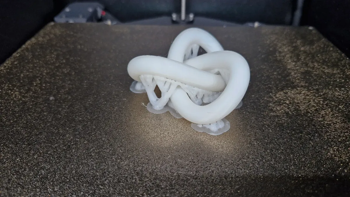 Torus Knot Sculpture Desk Toy, photo 3 of 3 - Torus Knot Sculpture Desk Toy Art