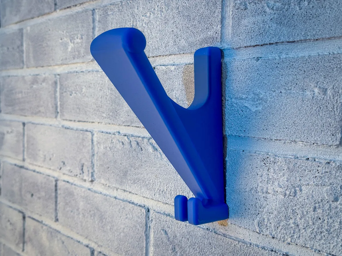 Helmet wall mount with hidden screws.