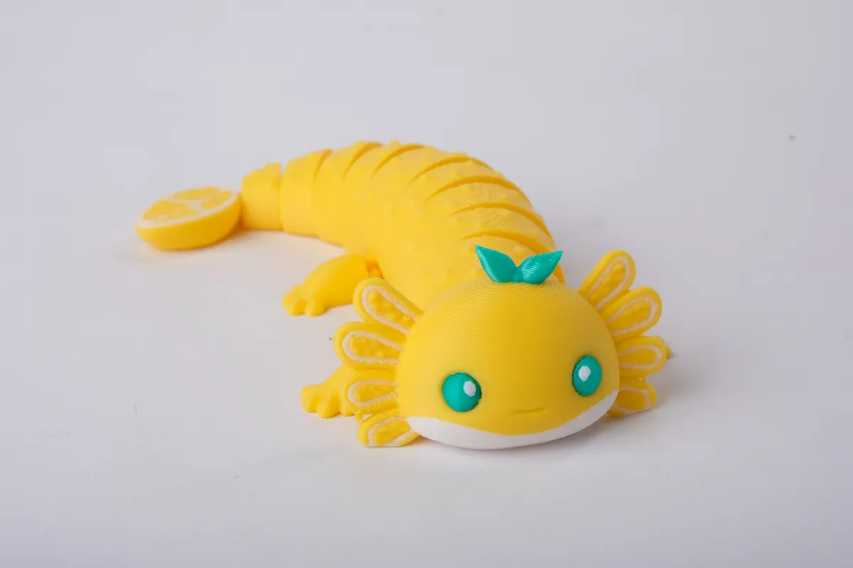 Lemon Axolotl Flexi Toy - Articulated Fidget, photo 2 of 4 - Lemon Axolotl Flexi Toy - Articulated Fidget Fidget & Sensory Toys