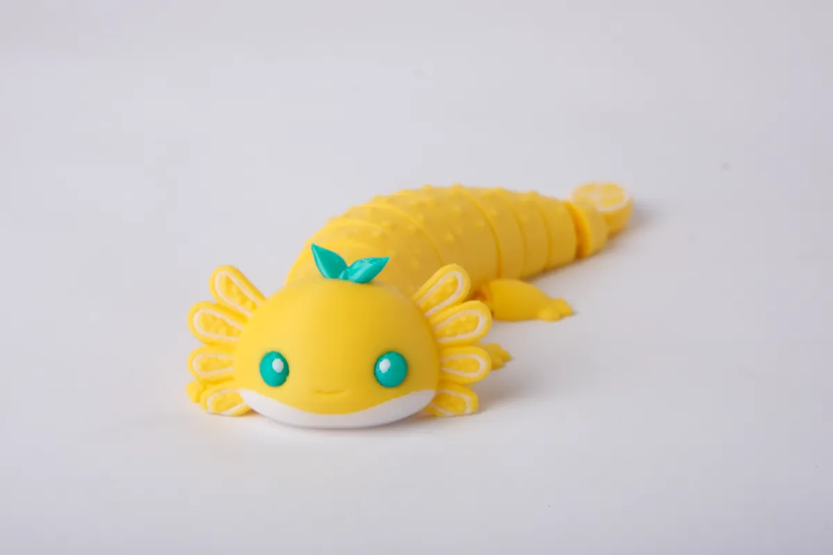 Lemon Axolotl Flexi Toy - Articulated Fidget, photo 4 of 4 - Lemon Axolotl Flexi Toy - Articulated Fidget Fidget & Sensory Toys