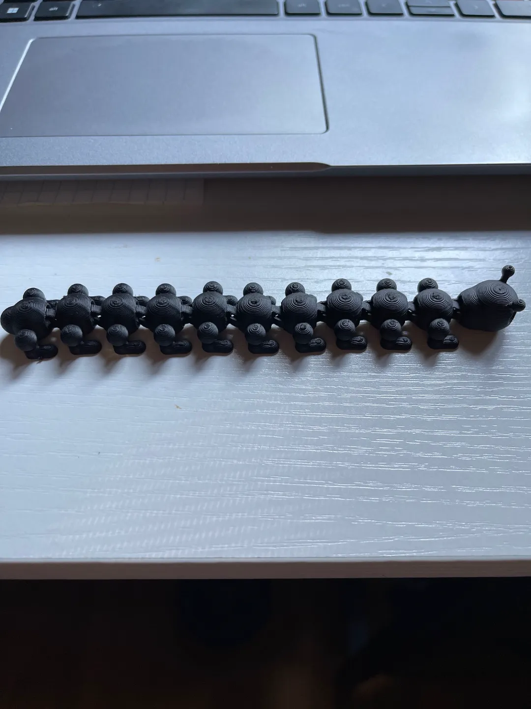 Articulated centipede wearing boots, photo 2 of 4 - Articulated centipede wearing boots Fidget & Sensory Toys