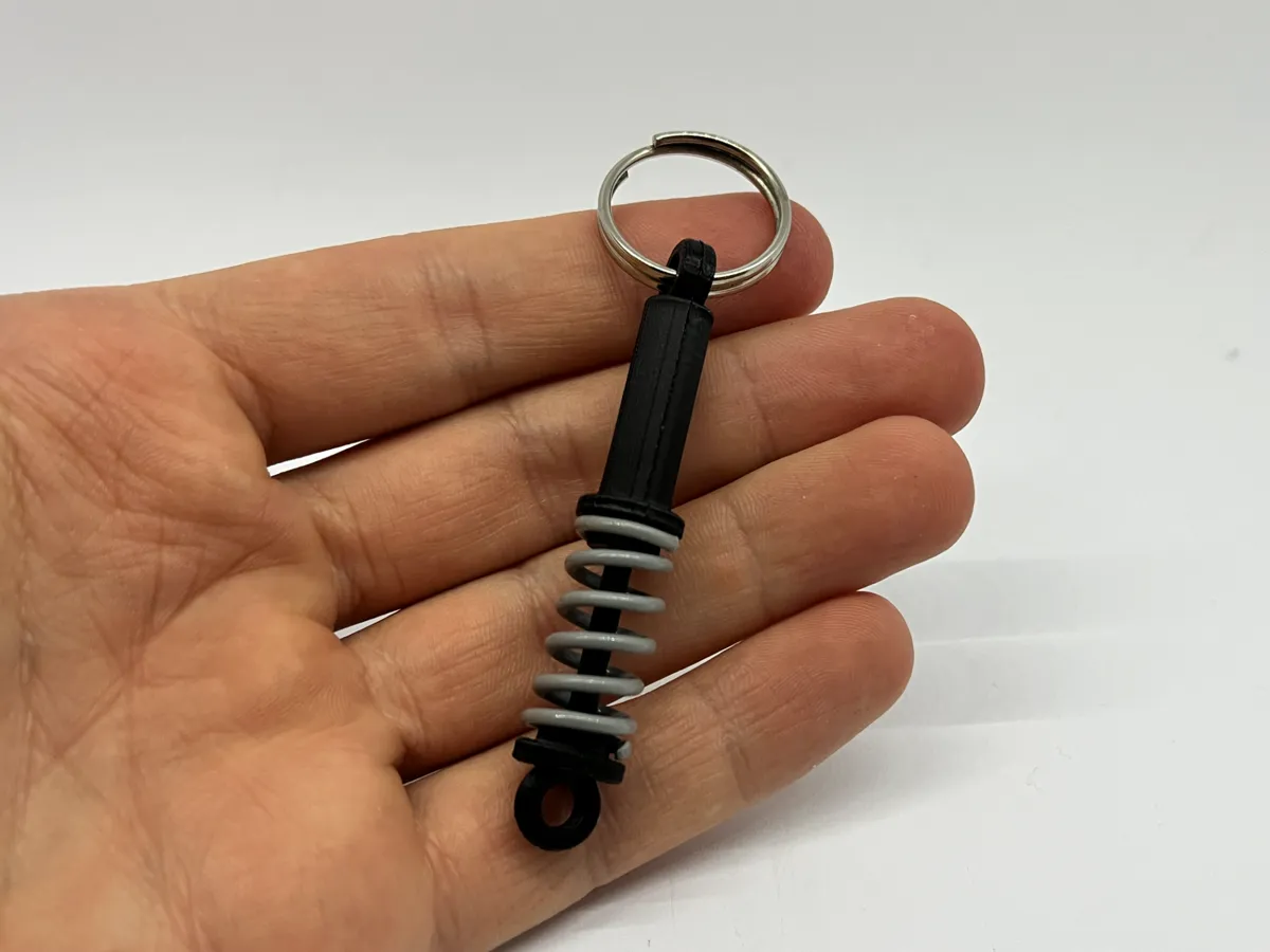 Shock Absorber Keytag, photo 2 of 2 - Shock Absorber Keytag Keychains