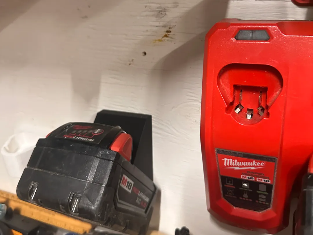 Tilted Milwaukee M18 Battery holder. - Power Tool & Battery Mounts, in stock