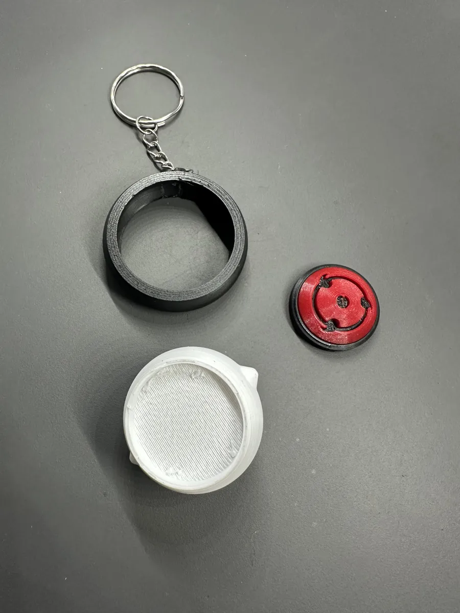 Sharingan rotating keychain