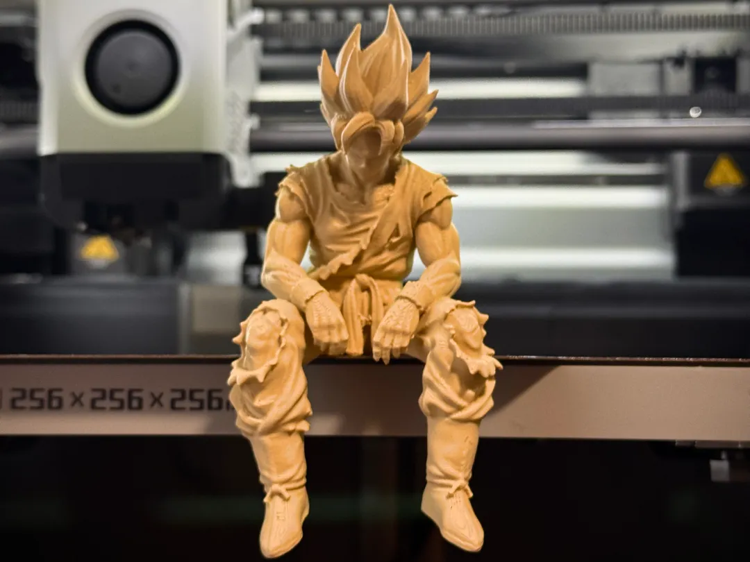 Sad Goku Figurine Sitting on a ledge!