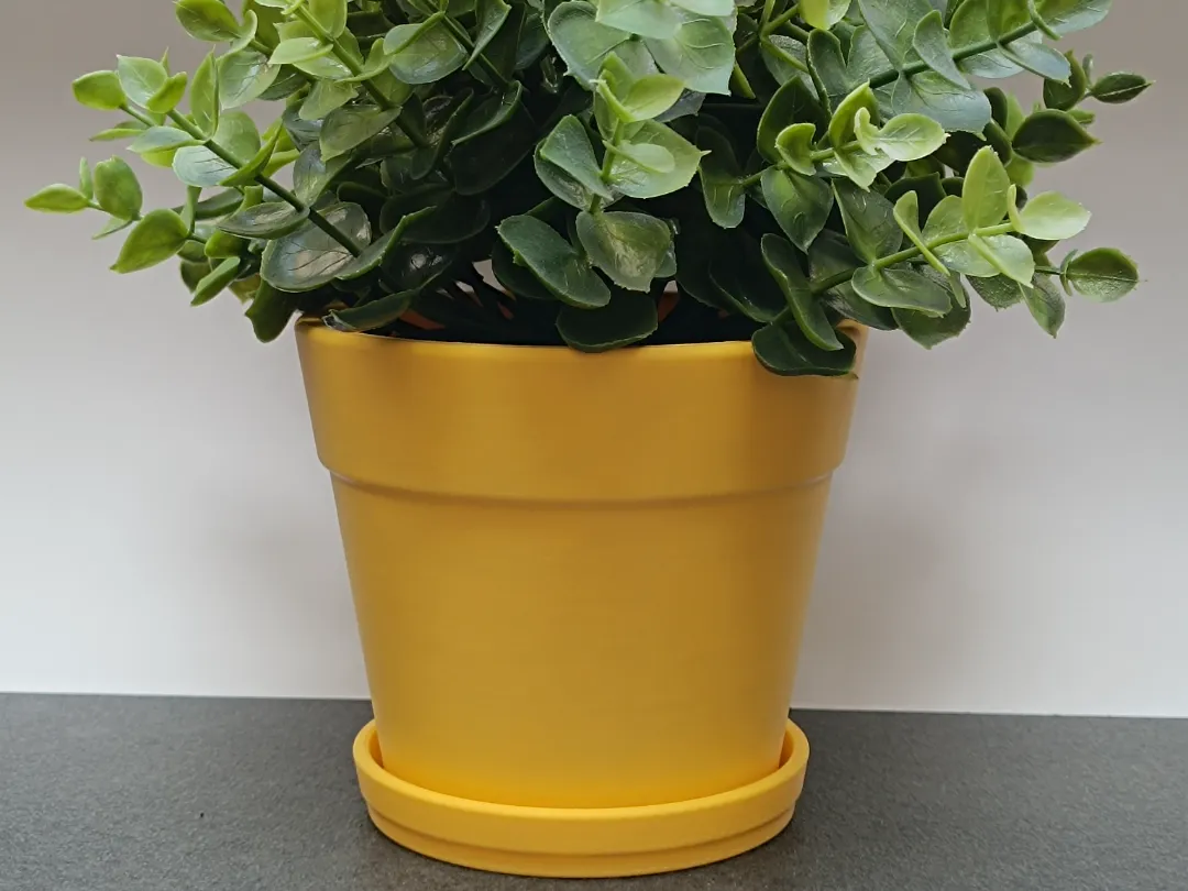 Classic terracotta plant pot with smart drainage