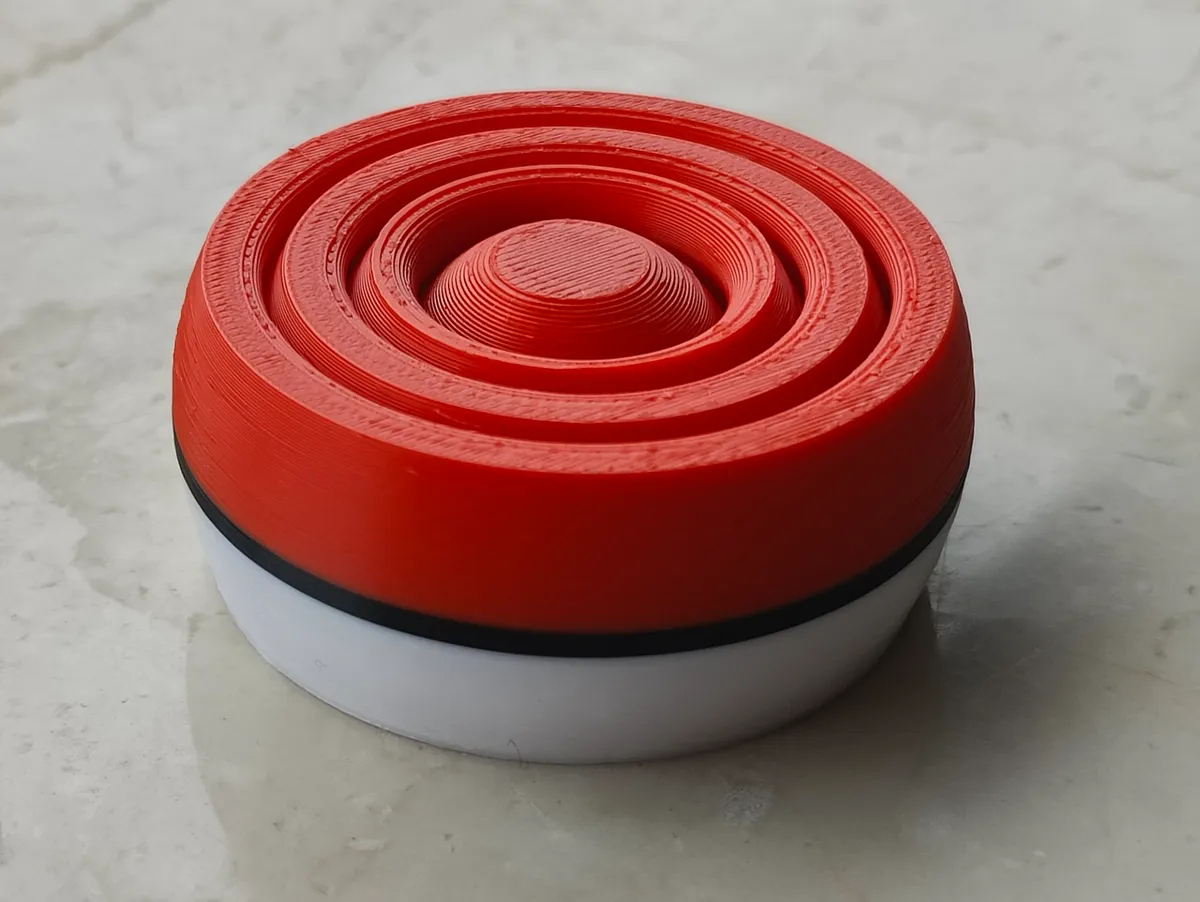 Pokéball-Inspired Gyro Fidget Toy, photo 3 of 3 - Pokéball-Inspired Gyro Fidget Toy Fidget & Sensory Toys