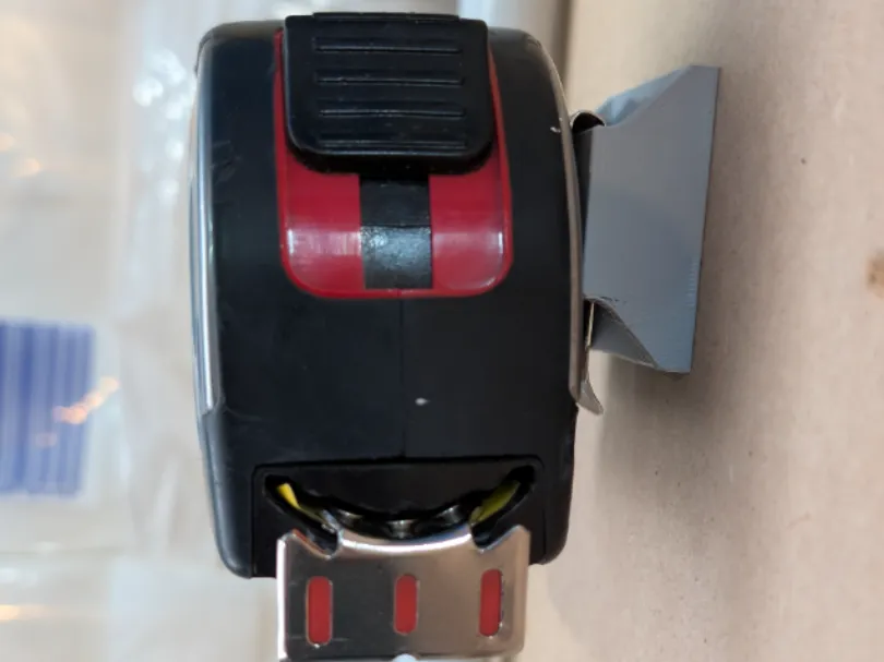 WALL TAPE MEASURE HOLDER