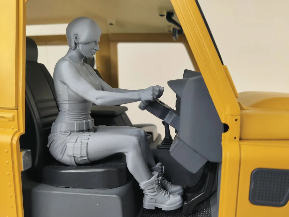 Driving figure adventure woman with short hair