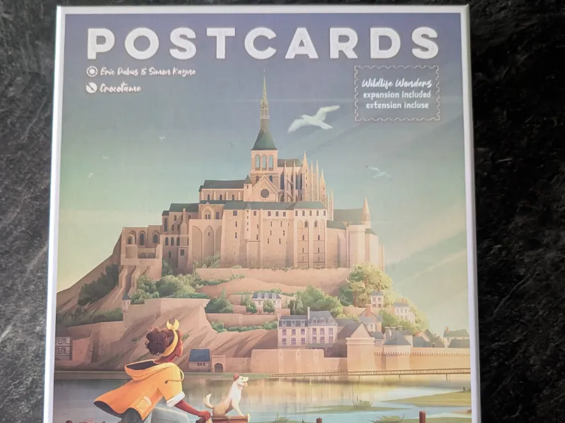 Rangement du jeu "Postcards".