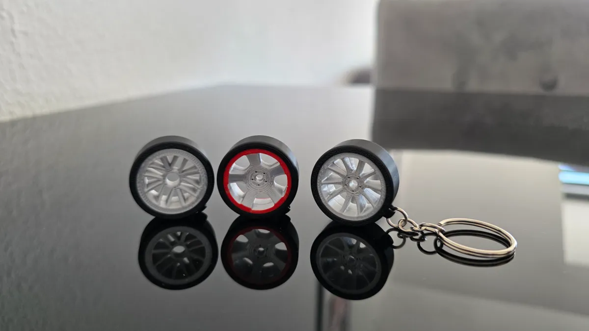 Car rim with tire keychain, photo 3 of 4 - Car rim with tire keychain Keychains