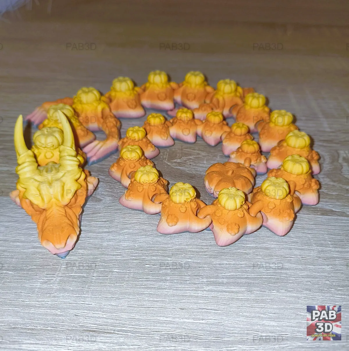 Articulated Flexi Dragon Pumpkin, photo 2 of 4 - Articulated Flexi Dragon Pumpkin Fidget & Sensory Toys