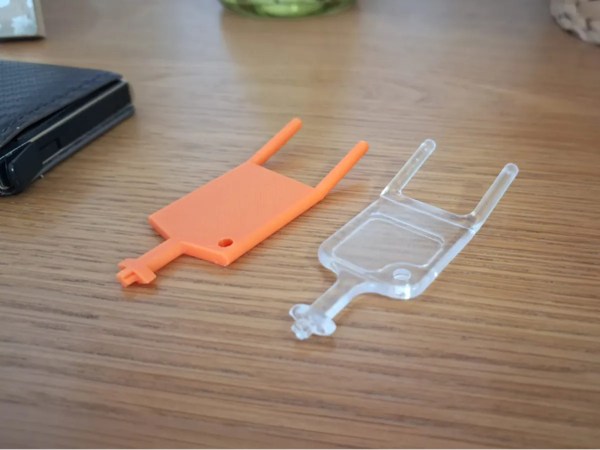 Toilet paper holder key