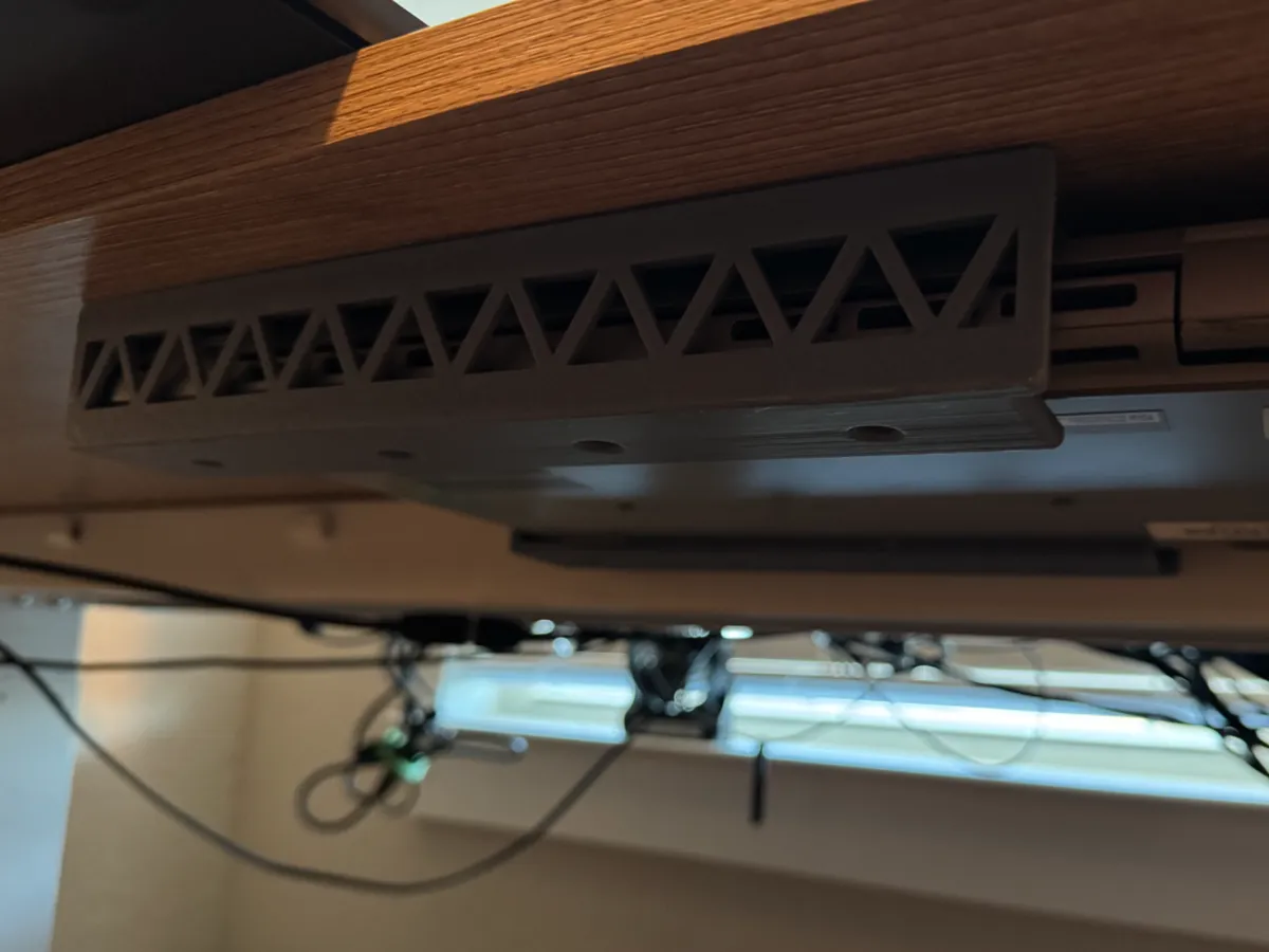 Under-desk laptop holder