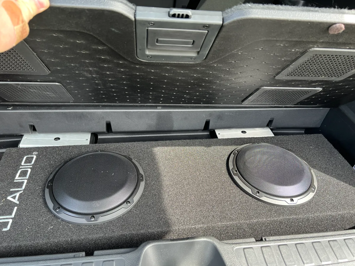 Subwoofer vent for enclosed spaces
