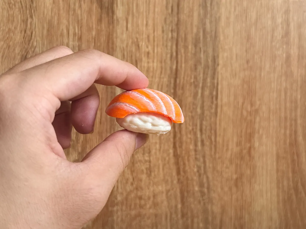 Clicky Sushi, Salmon Nigiri Fidget Toy, photo 2 of 3 - Clicky Sushi, Salmon Nigiri Fidget Toy Fidget & Sensory Toys