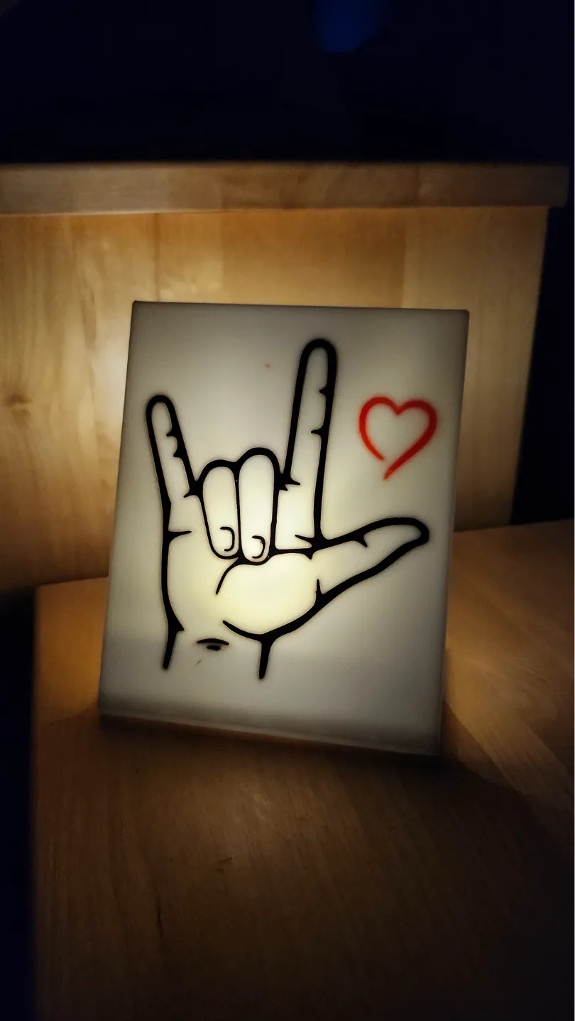 ' I love you ' in sign language using candle light