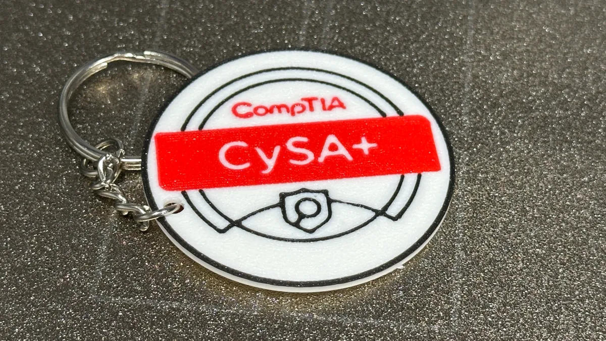 CompTIA CySA Certified Keychain - Luggage Tag, photo 2 of 3 - CompTIA CySA Certified Keychain - Luggage Tag Art