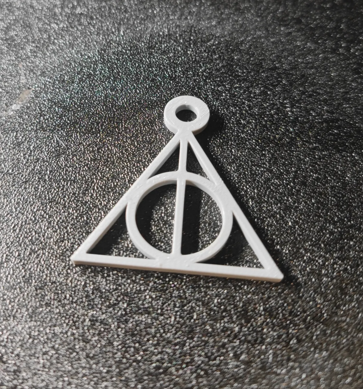 the deathly hallows keychain