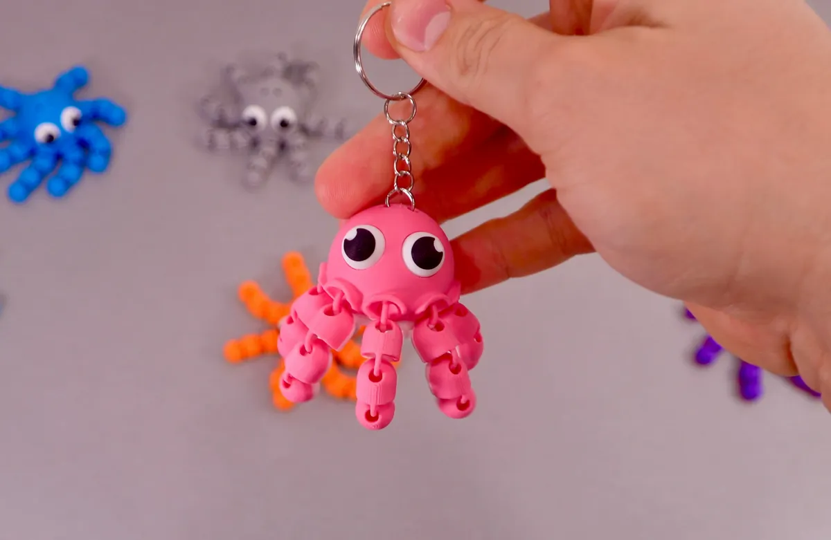 Articulated Flexy Octopus Keychain Fidget Toy, photo 3 of 4 - Articulated Flexy Octopus Keychain Fidget Toy Keychains