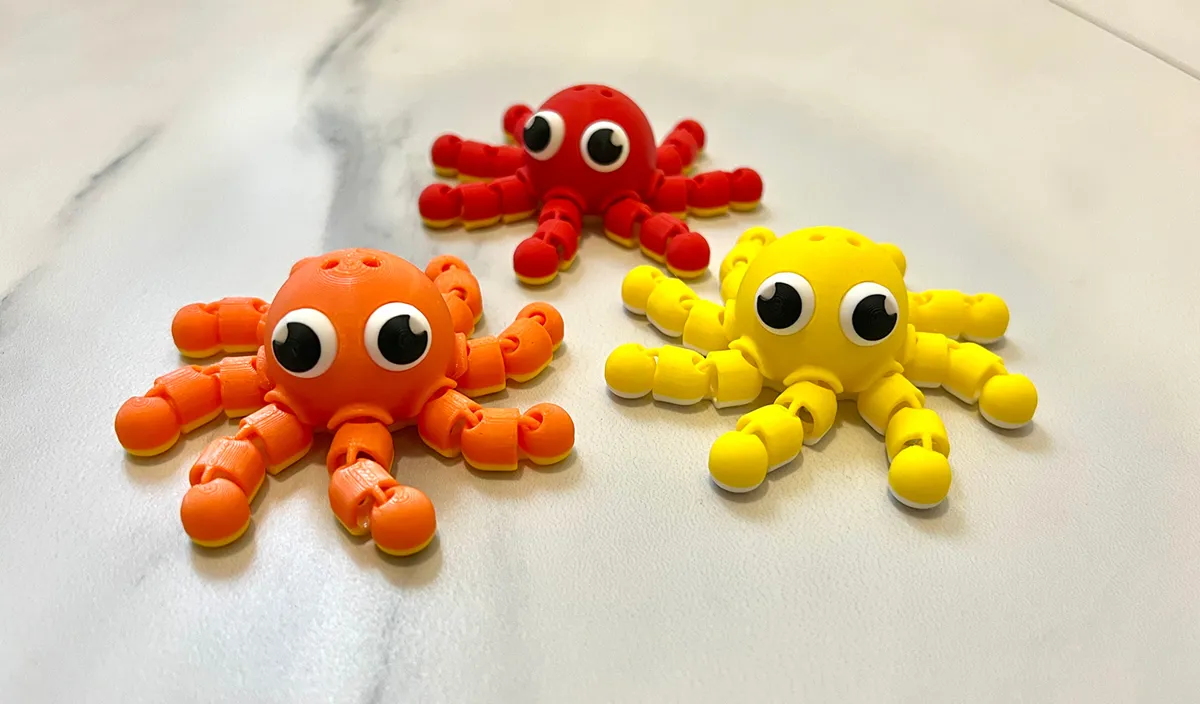 Articulated Flexy Octopus Keychain Fidget Toy, photo 4 of 4 - Articulated Flexy Octopus Keychain Fidget Toy Keychains