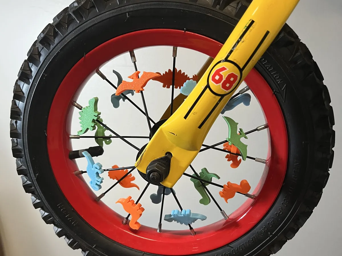 Dinosaur Bike Wheel Spoke Clips, photo 2 of 3 - Dinosaur Bike Wheel Spoke Clips Cycling