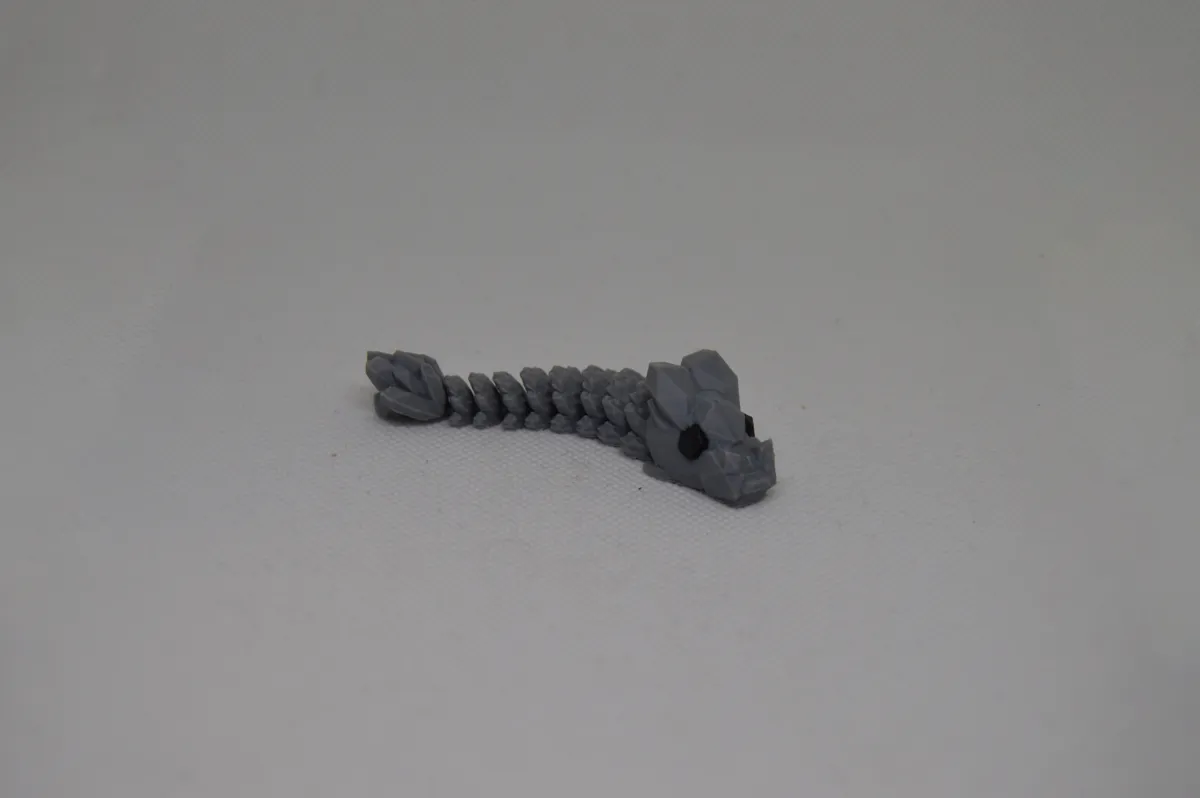 Little articulated stone dragon, photo 2 of 4 - Little articulated stone dragon Toys & Games