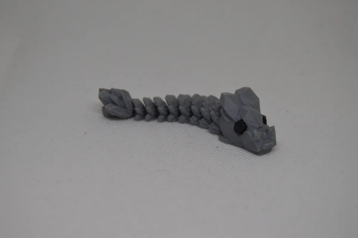 Little articulated stone dragon, photo 3 of 4 - Little articulated stone dragon Toys & Games