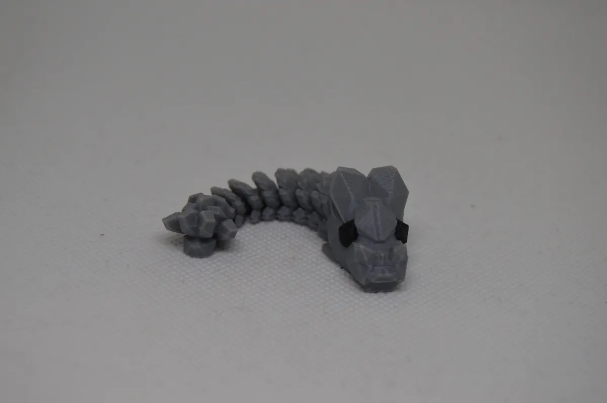 Little articulated stone dragon, photo 4 of 4 - Little articulated stone dragon Toys & Games