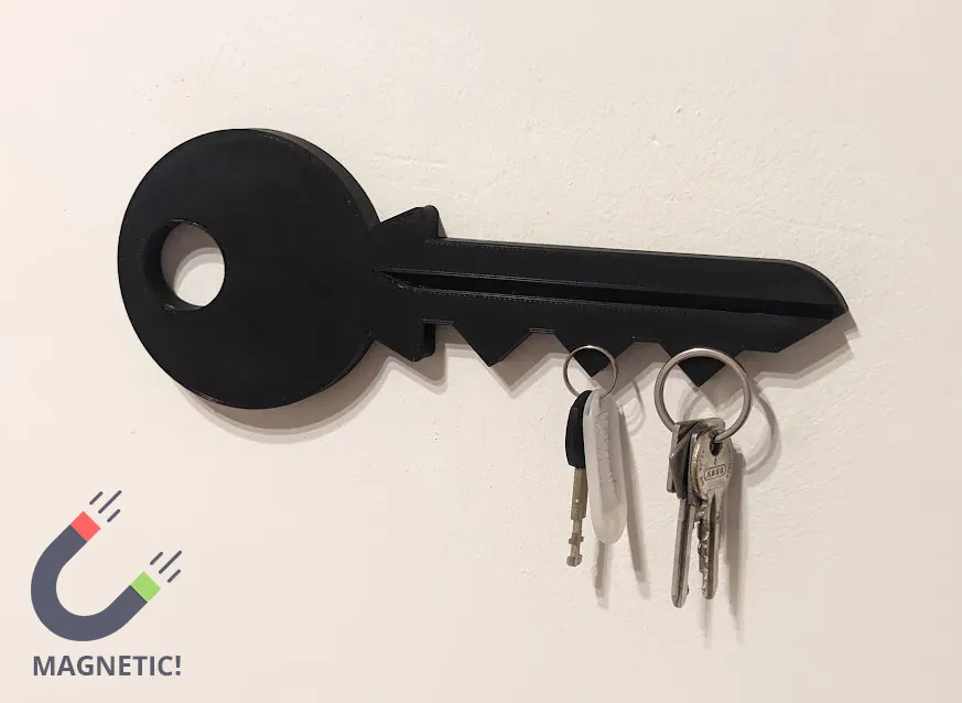Key-shaped magnetic key holder