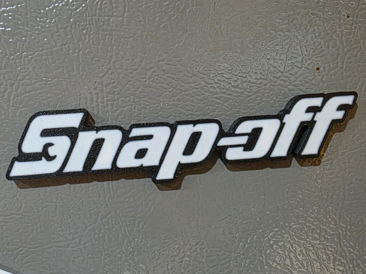 Snap-off toolbox badge