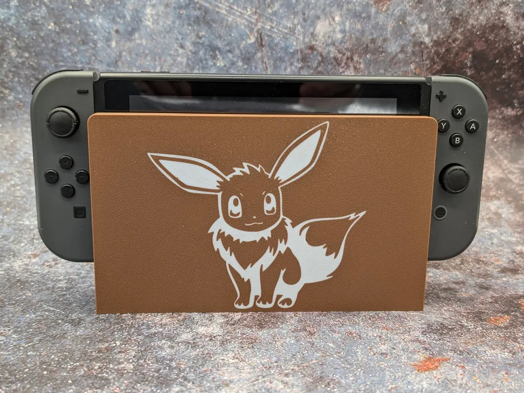 Nintendo Switch Dock Cover Eevee/Evoli v1, photo 2 of 3 - Nintendo Switch Dock Cover Eevee/Evoli v1 Gaming Accessories