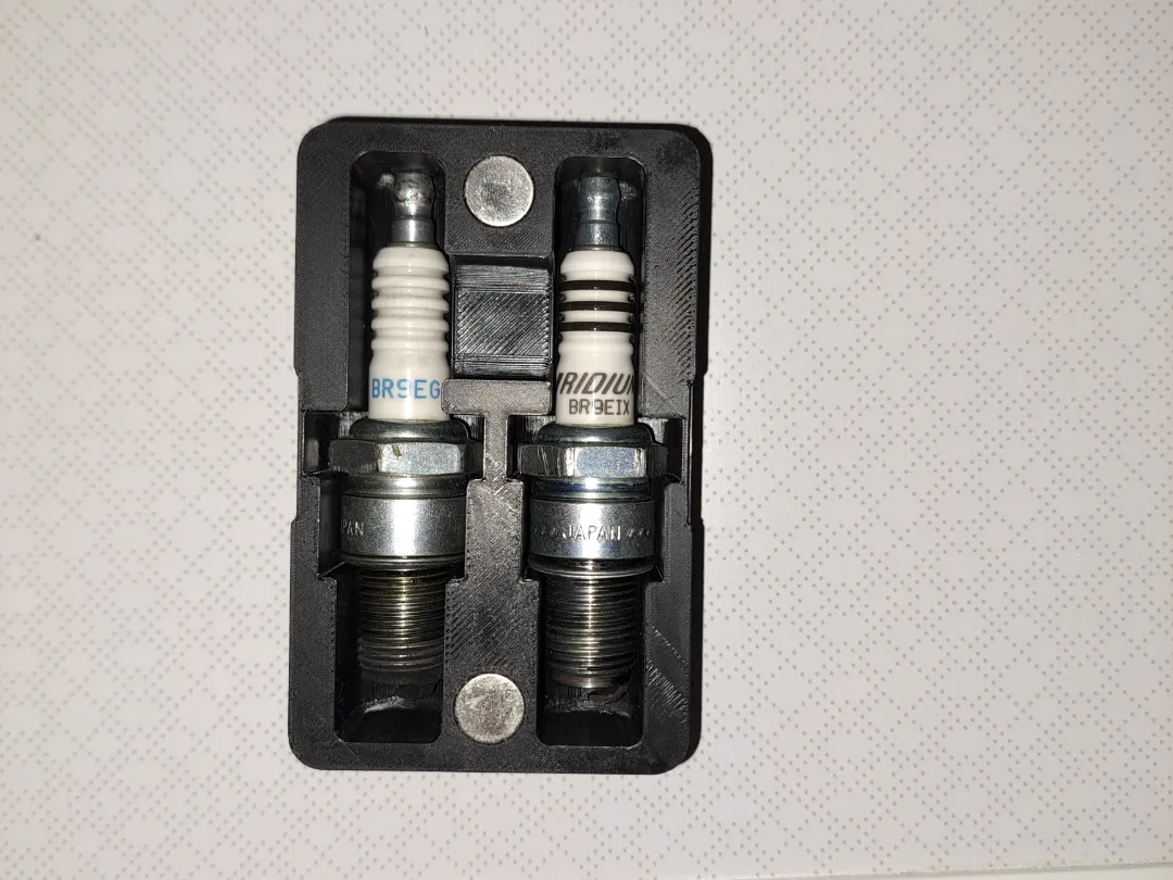 Spark plug holder