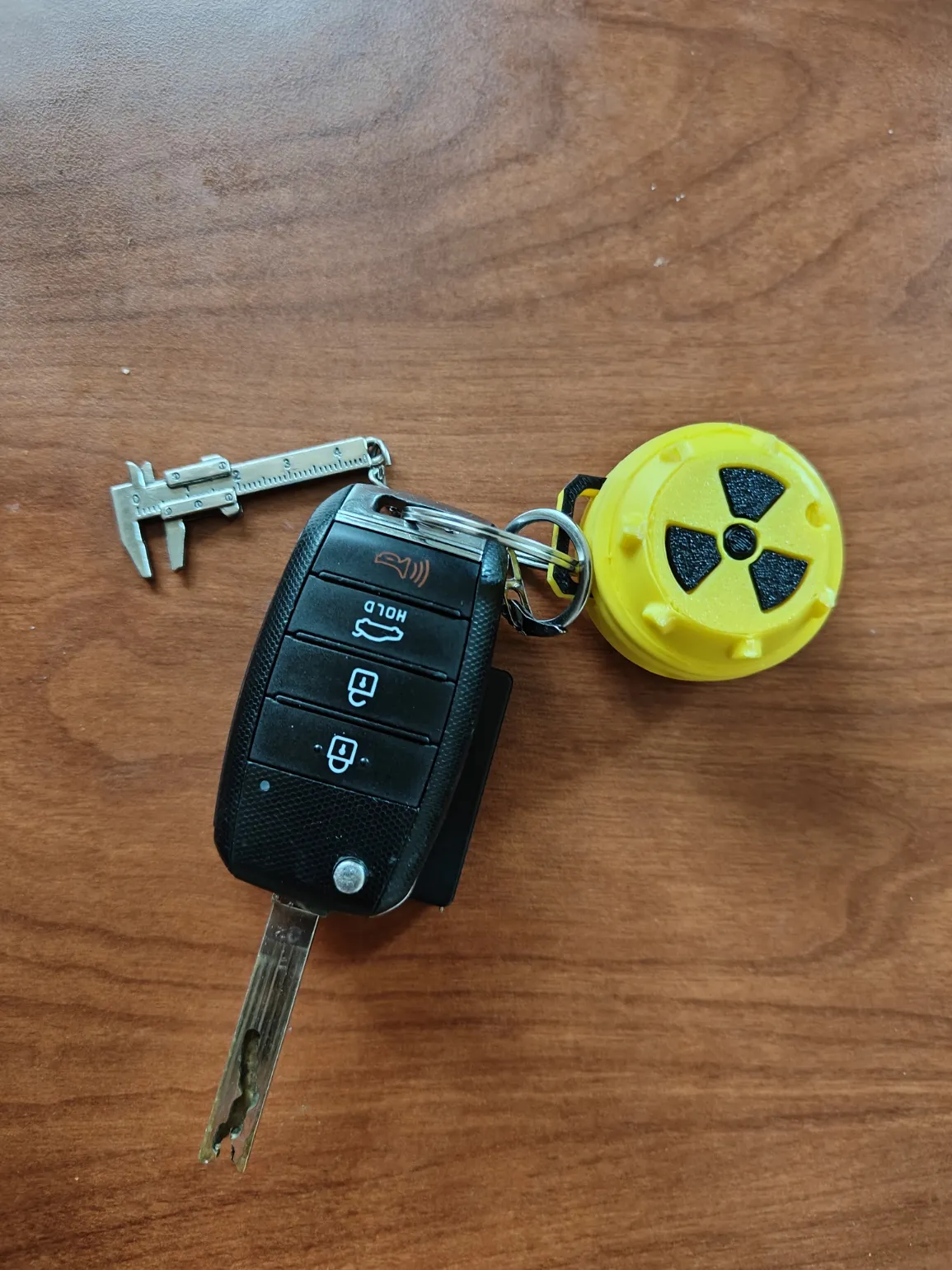 Rugged Airtag Case Keychain Nuclear Canister, photo 2 of 4 - Rugged Airtag Case Keychain Nuclear Canister Keychains