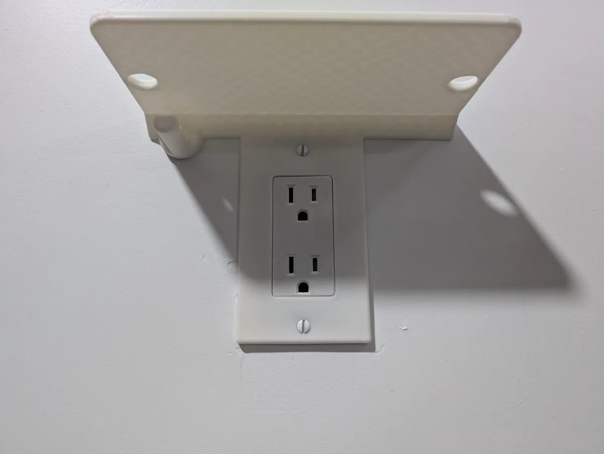 Power Outlet Cover with Phone and Watch holder, photo 2 of 3 - Power Outlet Cover with Phone and Watch holder Household