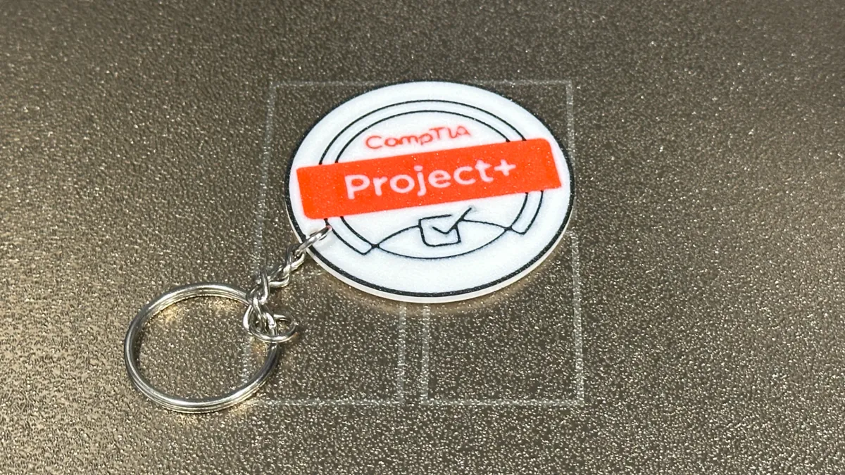 CompTIA Project+ Certified Keychain - Luggage Tag, photo 2 of 3 - CompTIA Project+ Certified Keychain - Luggage Tag Art