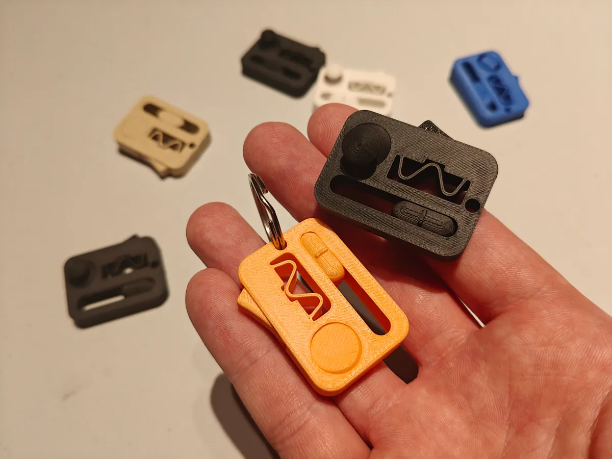 Mini fidget keychain with 3 fidgets, photo 3 of 4 - Mini fidget keychain with 3 fidgets Keychains