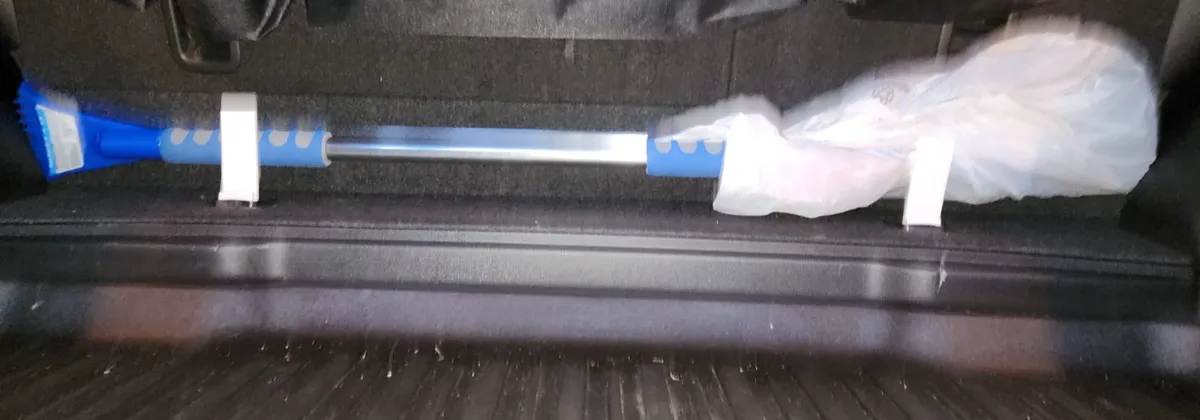 CRV trunk attachment for holding Snow brush