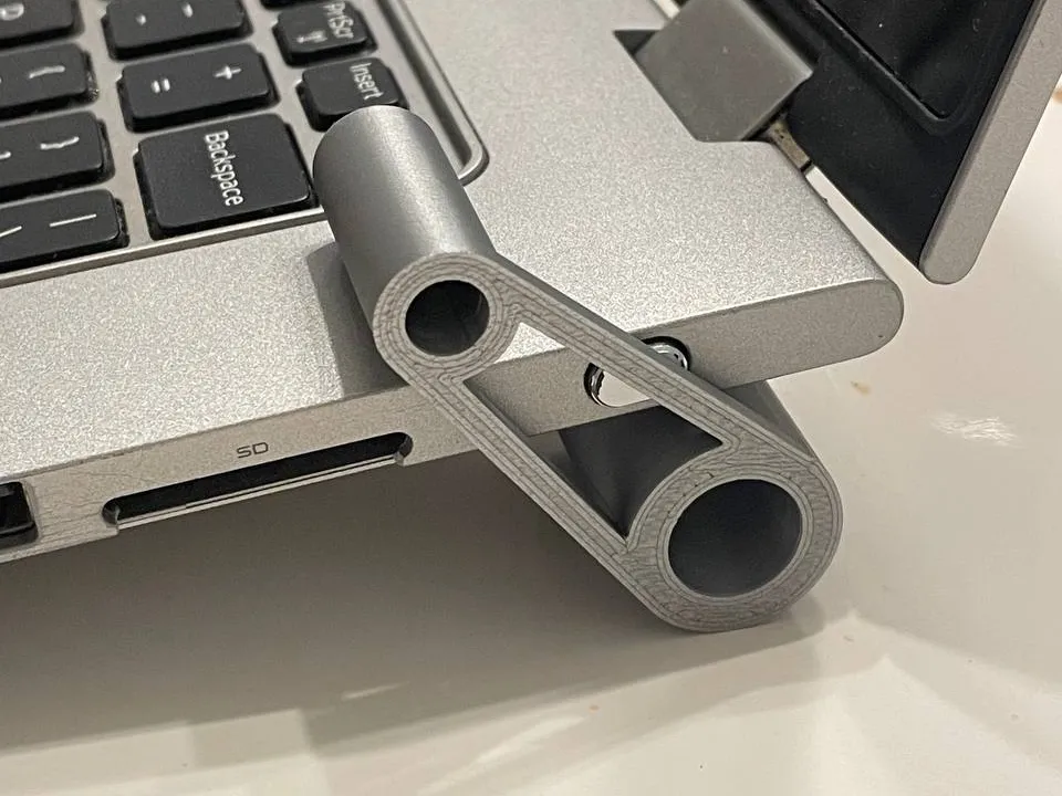 Simple and compact monitor riser for laptop