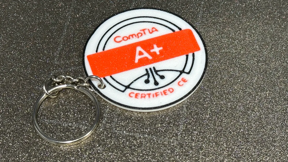 CompTIA Keychain Collection - Luggage Tag, photo 4 of 4 - CompTIA Keychain Collection - Luggage Tag Art