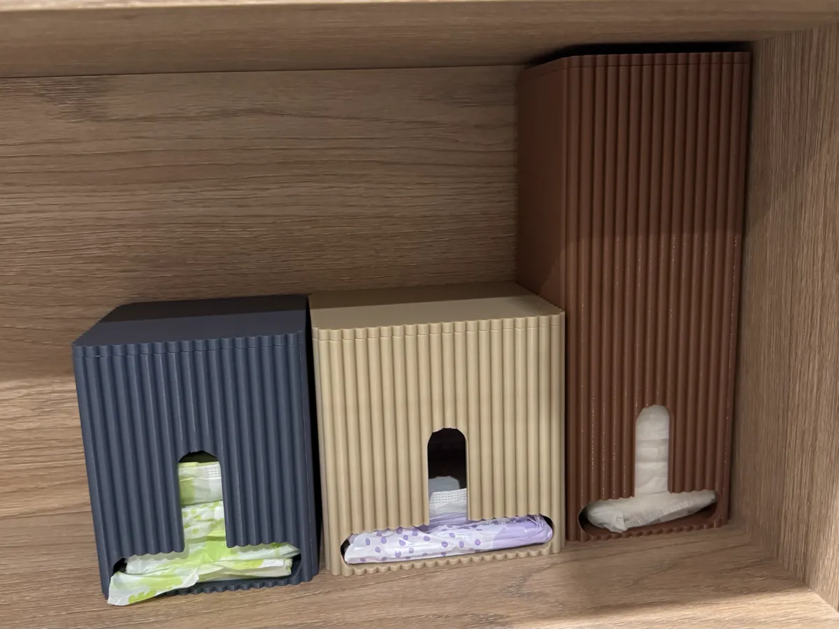 Sanitary pad dispenser