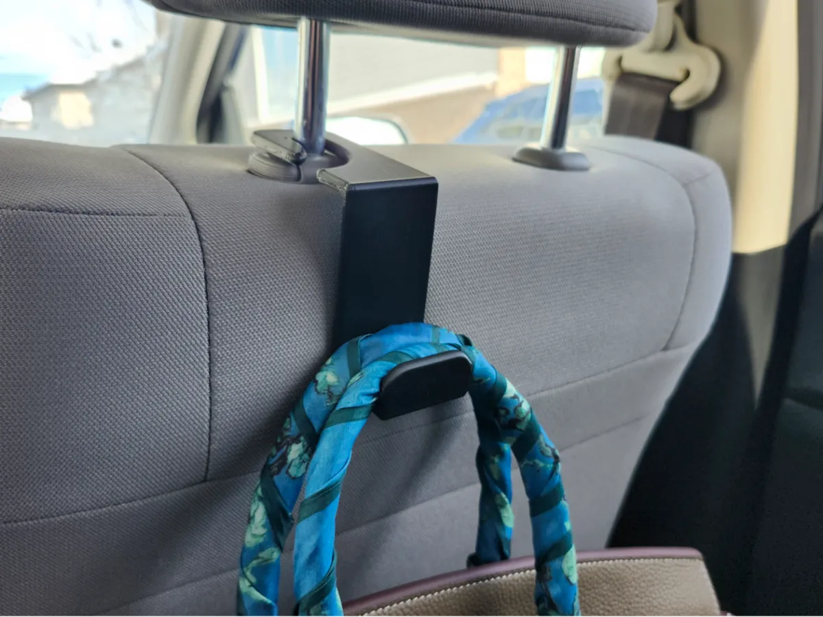 Car seat headrest hook